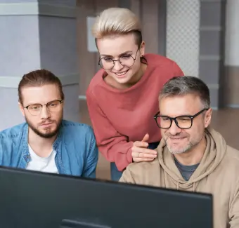 Doctor working on a laptop at a desk, demonstrating real time patient care and smart SaaS healthcare solutions by Script All DNA
