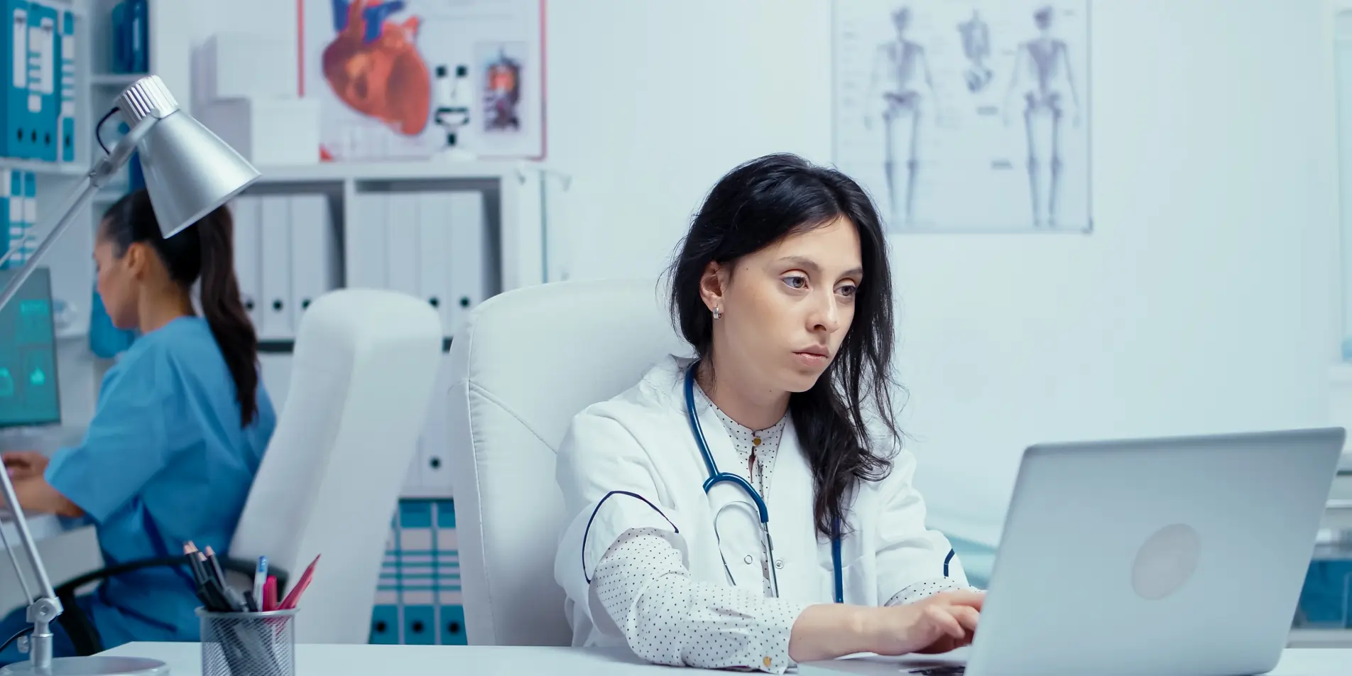 doctor-reviewing-ai-brain-scan-analytics-on-multiple-screens